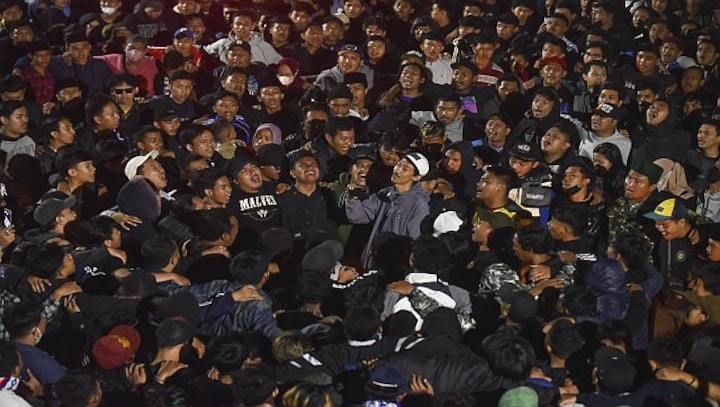 Explained: The stadium stampede exposes troubled history of football in Indonesia