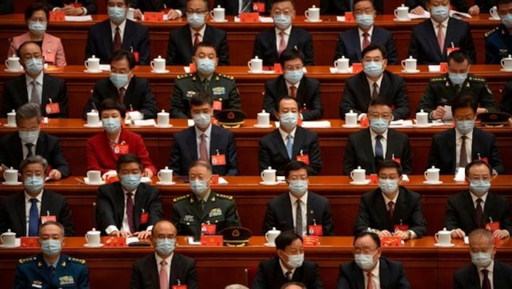 As China's Communist Party leaders meet, residents hope to end draconian 'zero-COVID' limits