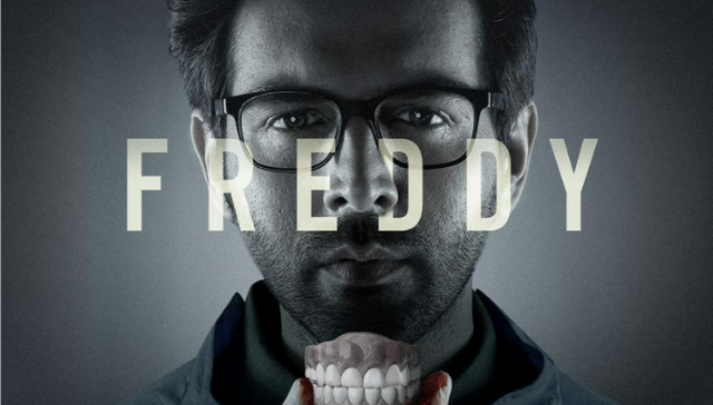 Freddy: Kartik Aaryan shares his intriguing first look holding a set of dentures Freddy: Kartik Aaryan shares his intriguing first look holding a set of dentures