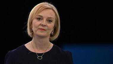 Liz Truss apologises for going 'too far too fast' on economic reforms but vows to stay on