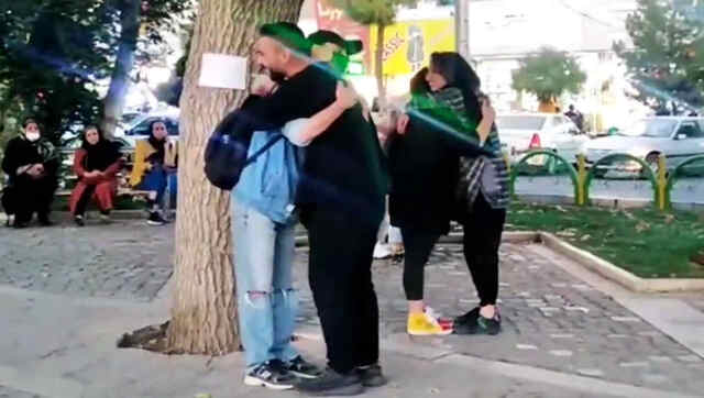 Iranian couple break law by hugging people in street since men, women forbidden from mixing from age 7 Iranian couple break law by hugging people in street since men, women forbidden from mixing from age 7