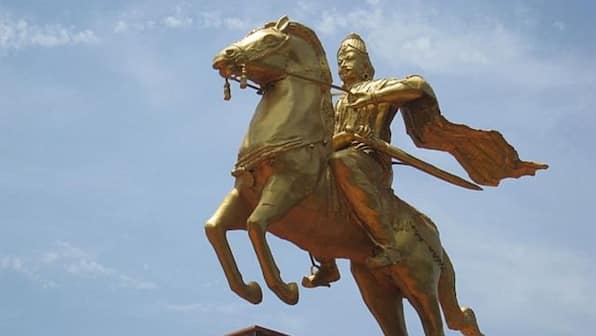 Who was Raja Raja Chola, the king whose religious identity has stoked a controversy?