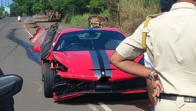 Occupants remain unhurt after speeding Ferrari crashes in road railing Occupants remain unhurt after speeding Ferrari crashes in road railing