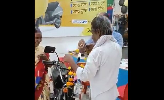 Video of man putting garland around his wife's neck instead of brand new bike goes viral Video of man putting garland around his wife's neck instead of brand new bike goes viral