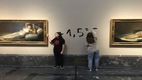 Climate activists glue themselves to Francisco de Goya paintings in Madrid's Prado Museum