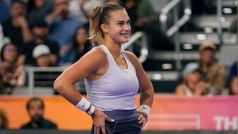 WTA Finals: Aryna Sabalenka stuns Iga Swiatek to set up title match against Caroline Garcia