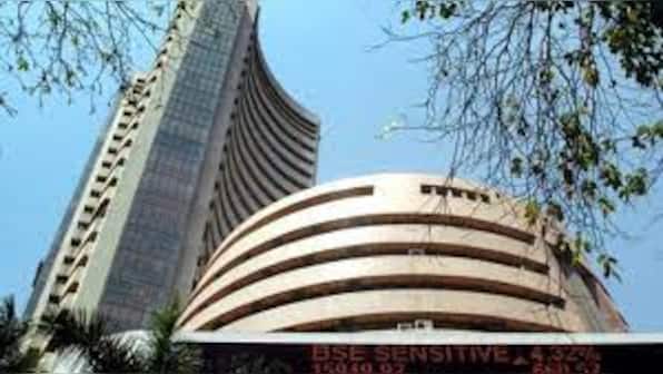 Sensex down over 285 points, Nifty holds 18,600 on weak global market trends and rising crude prices