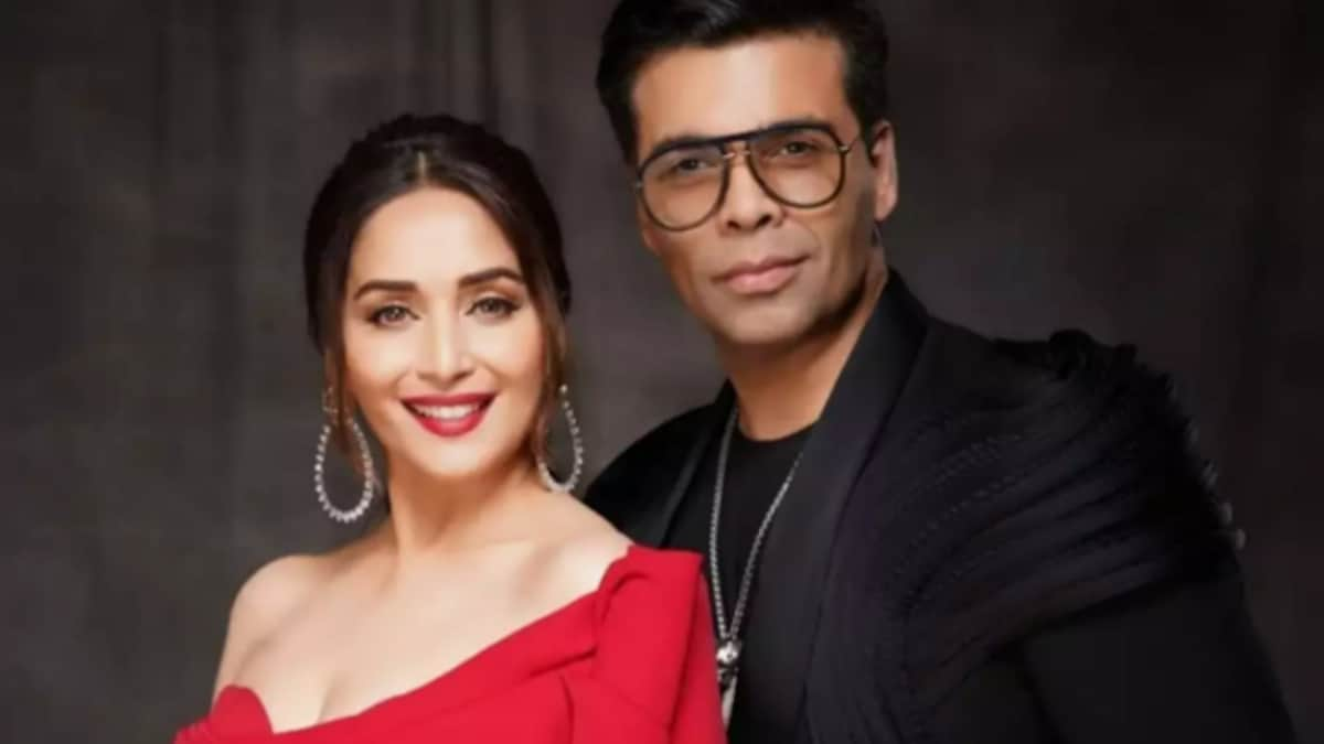 Twinning in dazzling black, Karan Johar and Madhuri Dixit give whirl to viral trend