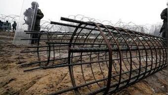 Amid war in Ukraine, a ‘barbed wire curtain’ rises in Europe