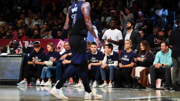 Fans in 'Fight Antisemitism' shirts courtside at Nets game after Kyrie Irving's anti-Jewish tweet