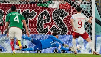 FIFA World Cup: Poland's 'emotional' Robert Lewandowski misses penalty in Mexico stalemate