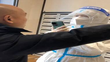 Watch: Chinese human rights lawyer Yu Wensheng, his wife kept under house arrest by men in hazmat suits