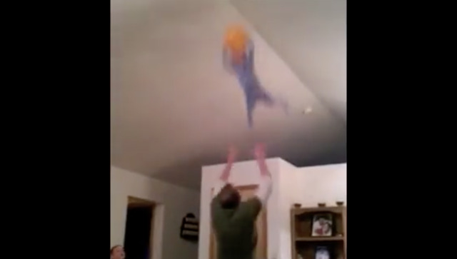 Viral video: Father throws child 'super-high' to the ceiling to catch balloon; internet shocked Viral video: Father throws child 'super-high' to the ceiling to catch balloon; internet shocked