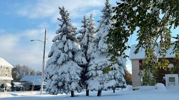 Massive snowfall buries cars, keeps falling in western New York