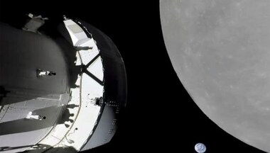 NASA capsule buzzes moon, last big step before lunar orbit