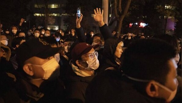 China eases controls, gives no sign when 'zero COVID' ends