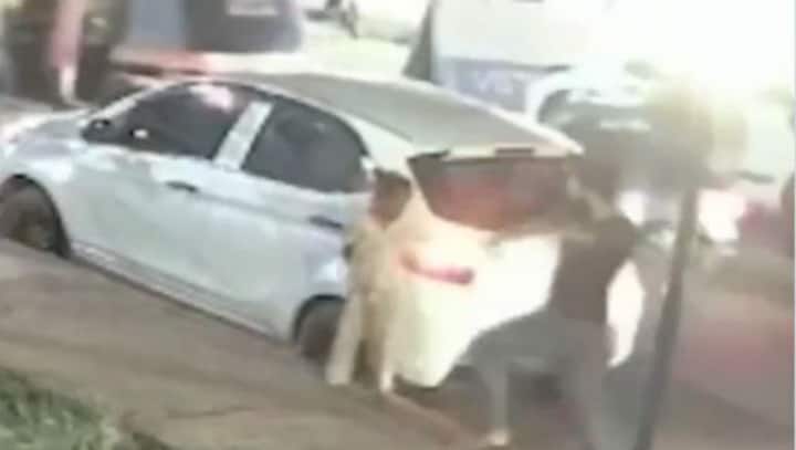 Watch: Man kicks six-year-old in the chest for leaning on his car