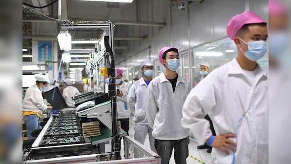 Timeline of unrest at China's largest iPhone factory over COVID curbs, working conditions