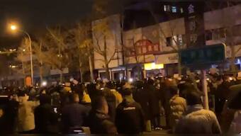 China: Beijing protesters spooked by phone calls from police