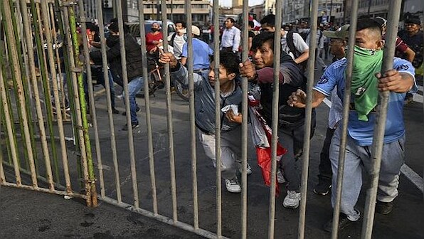 Peru protesters tear-gassed after president calls for truce