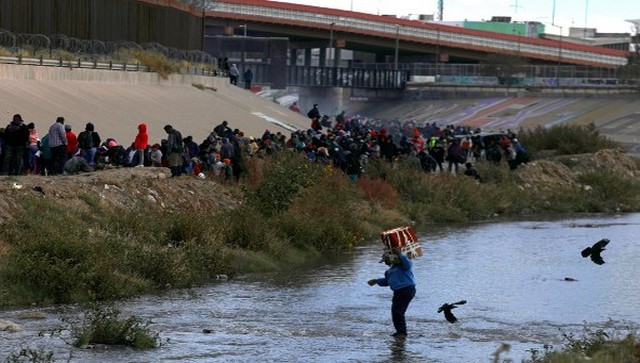 Migrants amass on Mexico-US border ahead of health policy expiration next week Migrants amass on Mexico-US border ahead of health policy expiration next week