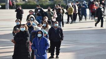 China to start issuing new passports as virus curbs ease