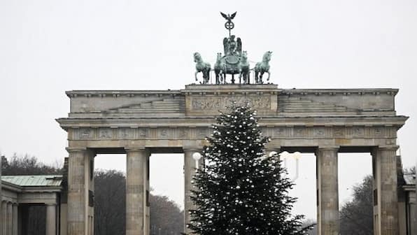 ‘This is only the tip of the Christmas tree’: German climate activists chop off Xmas tree in protest