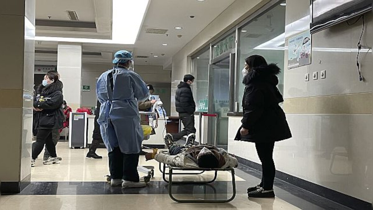 Infected doctors, no beds, long queues: How Chinese hospitals are struggling with COVID surge