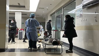 Infected doctors, no beds, long queues: How Chinese hospitals are struggling with COVID surge