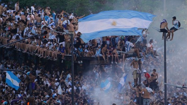 Argentina lauds World Cup-winning footballers in divided, crisis-driven country
