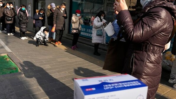 China says producing 60 million antigen test kits per day, but then why aren't people getting them?