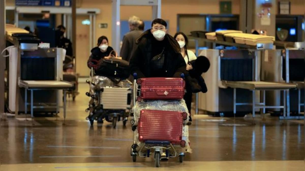 Japan to drop mask guidance, relax Covid strategy