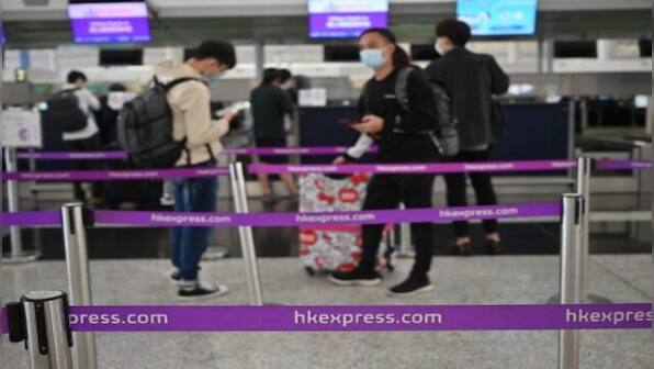 Hong Kong asks Japan to reverse 'hasty' COVID-19 flight curbs