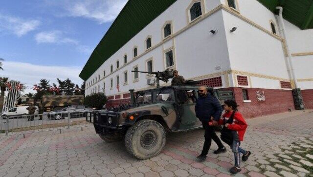 Tunisians to vote on parliament with 'no political weight' in polls boycotted by opposition Tunisians to vote on parliament with 'no political weight' in polls boycotted by opposition