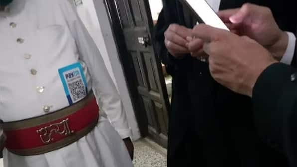 Allahabad HC official suspended after image wearing payment scan code goes viral