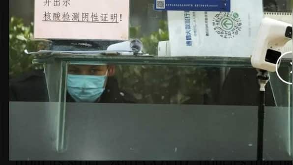 China to drop travel tracing requirement as it relaxes strict 'zero-COVID' policy
