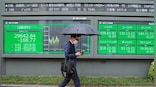 Asian markets mostly down on worries over rate hikes, inflation