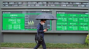 Asian markets mostly down on worries over rate hikes, inflation