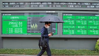 Asian markets mostly down on worries over rate hikes, inflation