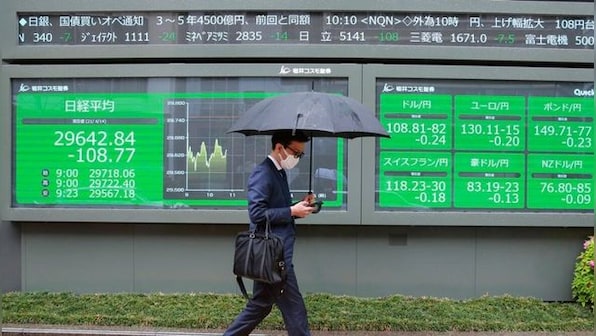 Asian markets mostly down on worries over rate hikes, inflation