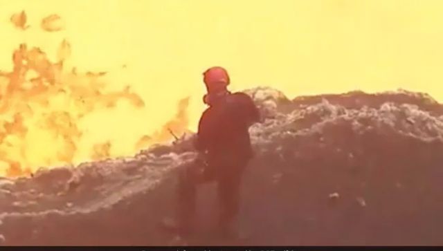 Video of man standing close to 'lava ocean' goes viral; internet left stunned Video of man standing close to 'lava ocean' goes viral; internet left stunned