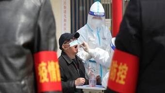 Amid Covid spike Chinese cities distribute free fever drugs