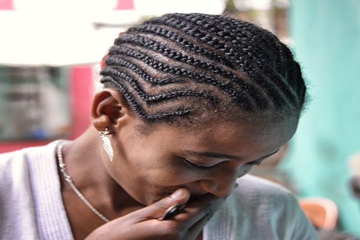 The Hair Revolution: America's CROWN Act and how enslaved people historically used cornrows to communicate escape routes