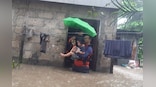 Philippines floods force tens of thousands to flee homes