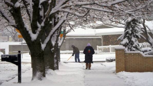 In Buffalo and suburbs, National Guard checks homes for storm victims