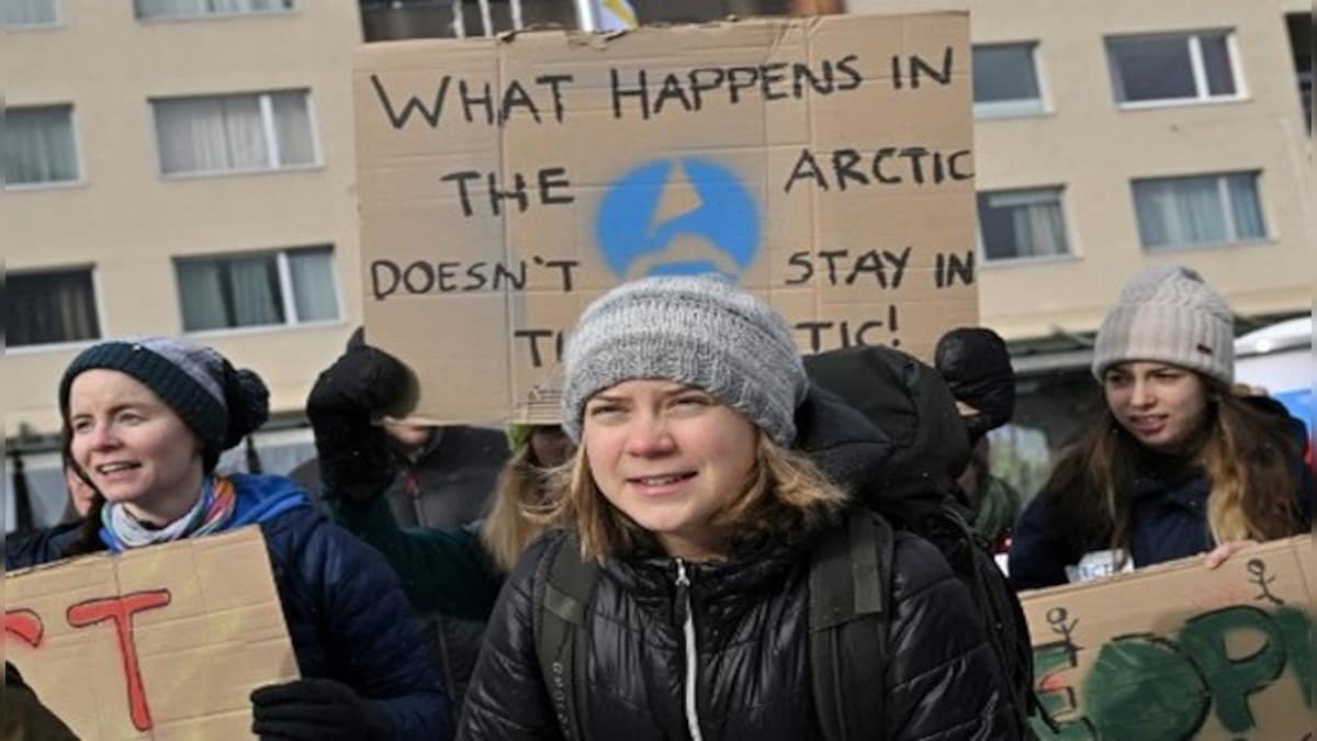 'What do we want? Climate justice!' Greta Thunberg, activists protest at World Economic Forum