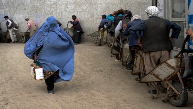 WATCH: Taliban surround a woman in a pit and stone her WATCH: Taliban surround a woman in a pit and stone her