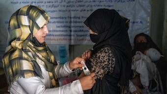 Taliban ban on women aid workers in Afghanistan is 'potential death blow', warns UN