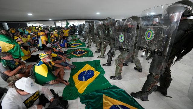 Brazil police wrest back seat of power from pro-Bolsonaro rioters Brazil police wrest back seat of power from pro-Bolsonaro rioters
