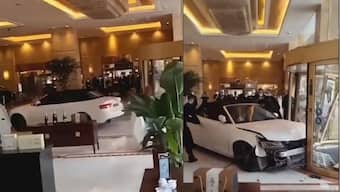 WATCH: Angry man's wild car tirade inside China luxury hotel lobby
